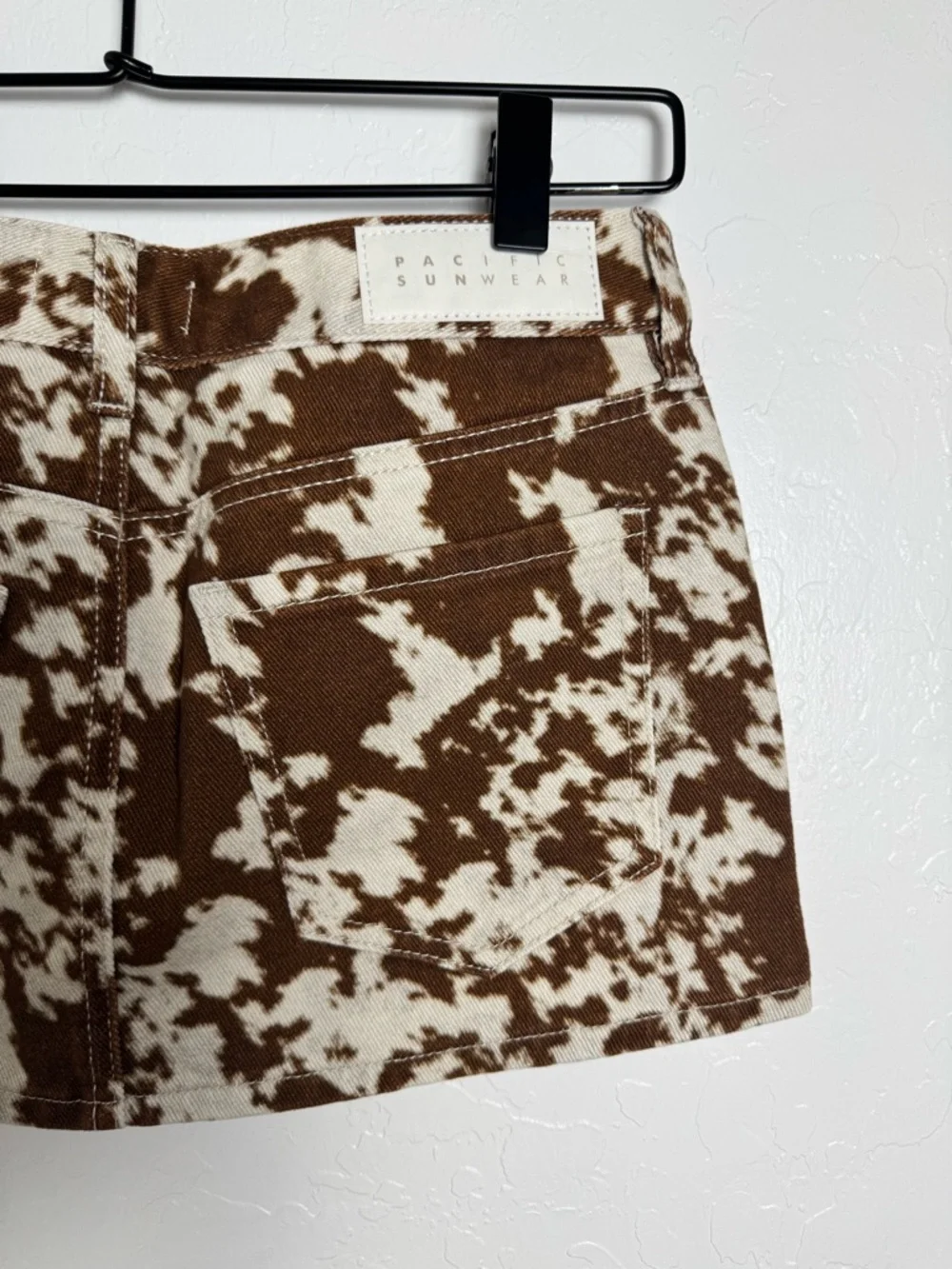 PacSun Cow Print Low Rise Denim Micro Skirt